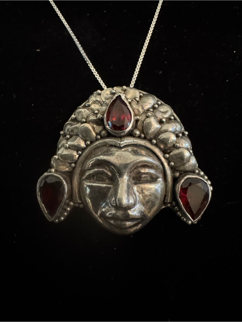 Beautiful Sterling Silver Face Pendant Necklace with Deep Red Garnet Accents